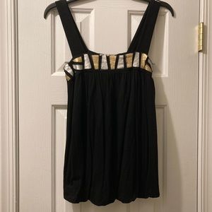 Sleeveless size small tank type black top with gold and silver trim